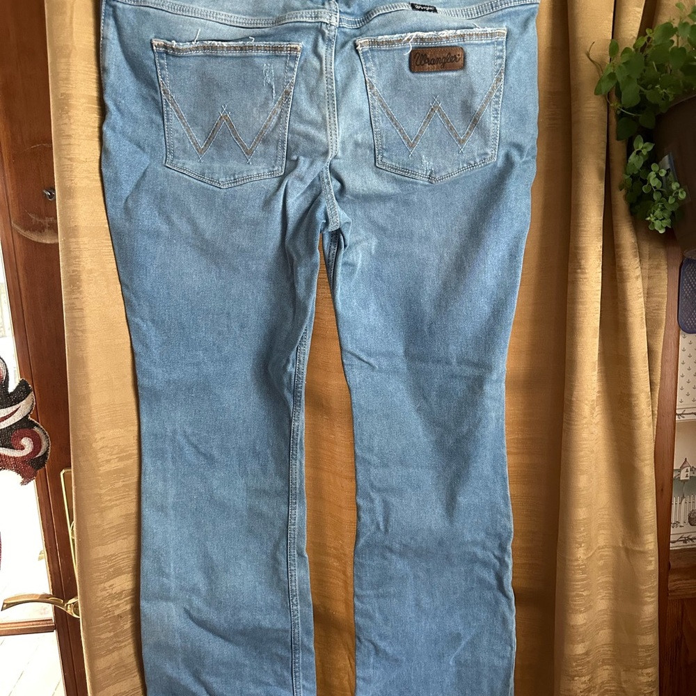 New women's low rise Wrangler boot cut jeans